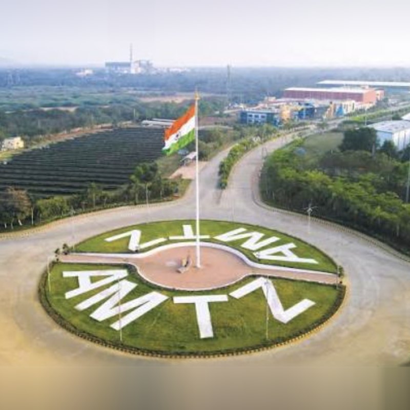 AMTZ campus entrance roundabout with the national flag